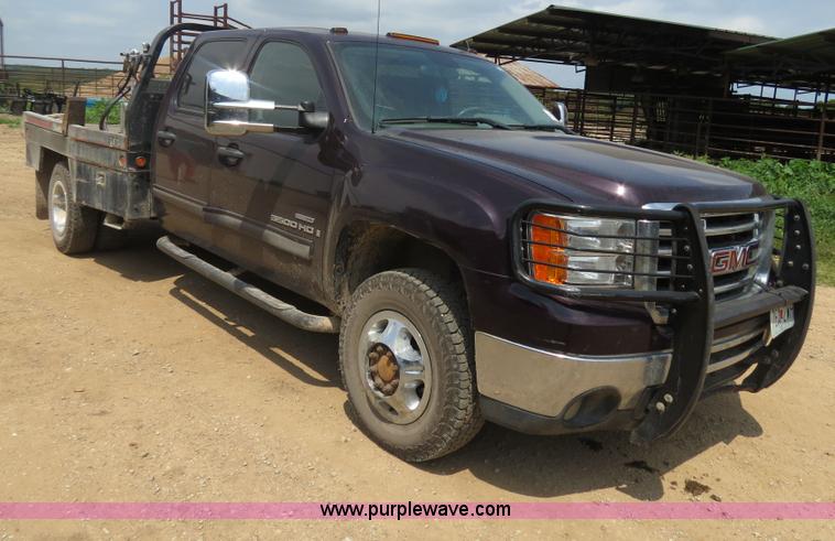image for item I9542 2008 GMC Sierra 3500HD Crew Cab flatbed truck