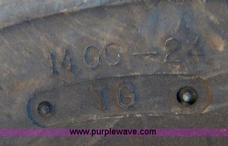 image for item AC9377 (2) 14.00-24 tires and wheels