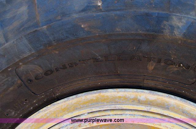 image for item AC9377 (2) 14.00-24 tires and wheels