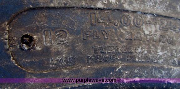 image for item AC9377 (2) 14.00-24 tires and wheels