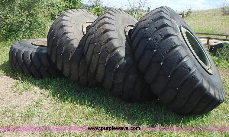 image for item BA9175 (4) General 23.5-25 tires and wheels
