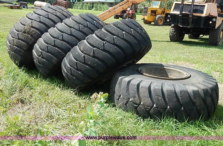 image for item BA9175 (4) General 23.5-25 tires and wheels