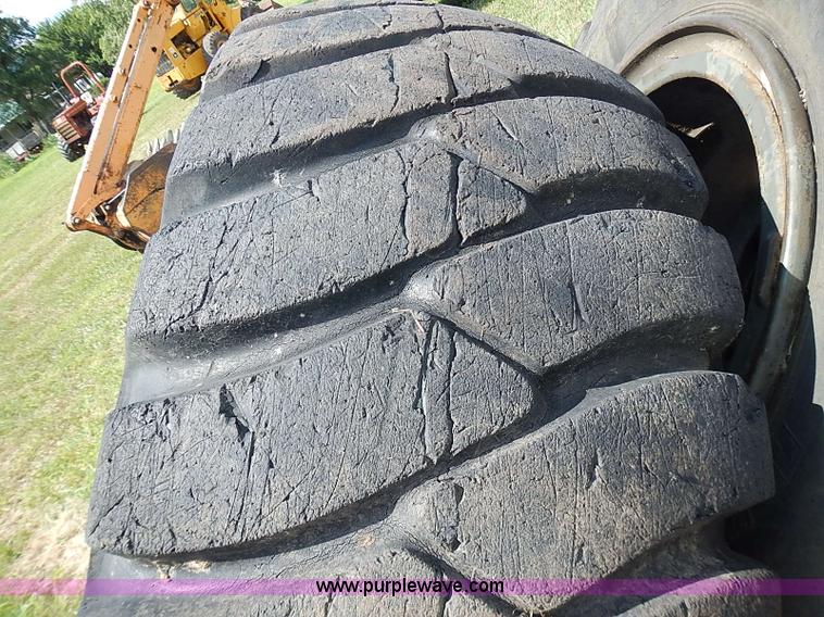image for item BA9175 (4) General 23.5-25 tires and wheels
