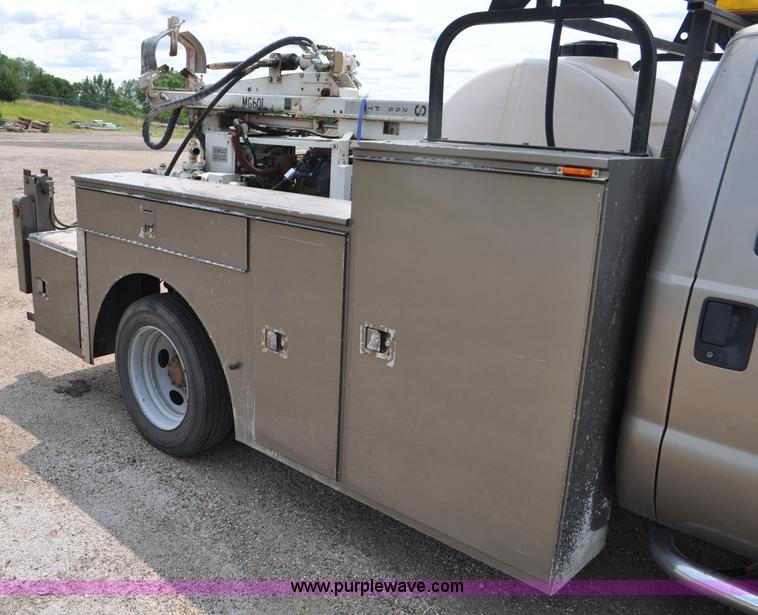 image for item F2040 2007 Ford F550 Super Duty XL utility truck with core drill