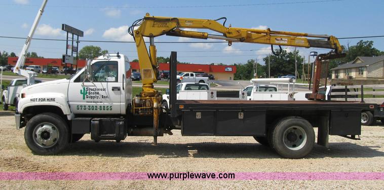 image for item F4931 2000 Chevrolet C7500 flatbed truck with crane
