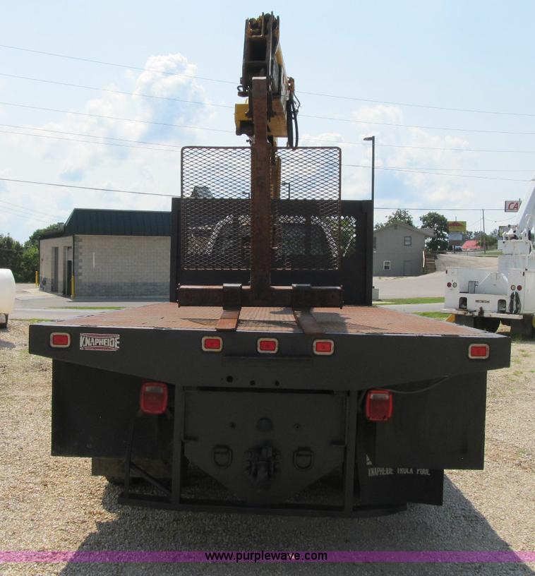 image for item F4931 2000 Chevrolet C7500 flatbed truck with crane