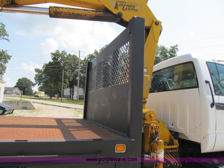 image for item F4931 2000 Chevrolet C7500 flatbed truck with crane
