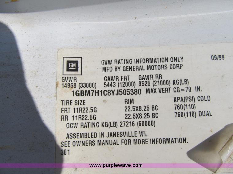 image for item F4931 2000 Chevrolet C7500 flatbed truck with crane