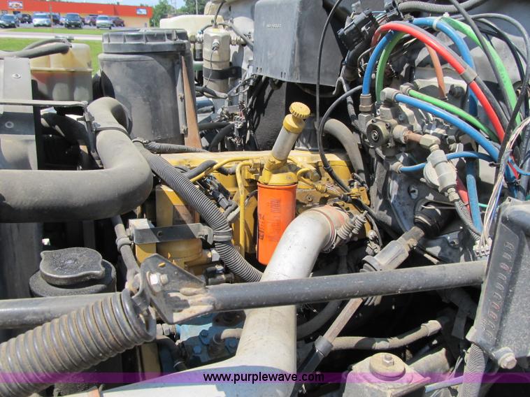 image for item F4931 2000 Chevrolet C7500 flatbed truck with crane