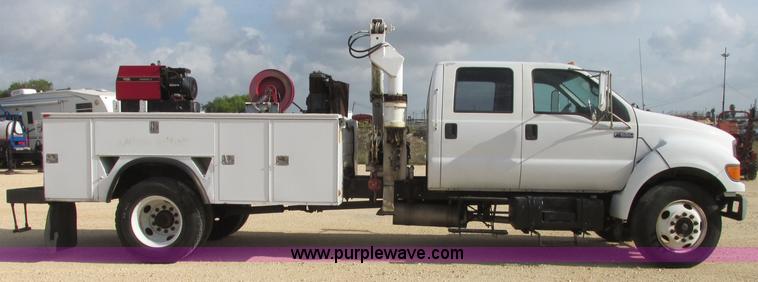 image for item I3500 2000 Ford F650 Super Duty XL Crew Cab service truck with crane