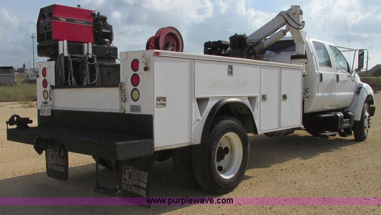 image for item I3500 2000 Ford F650 Super Duty XL Crew Cab service truck with crane