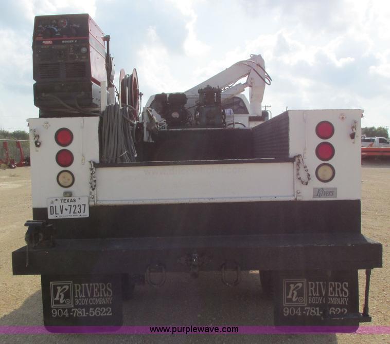 image for item I3500 2000 Ford F650 Super Duty XL Crew Cab service truck with crane