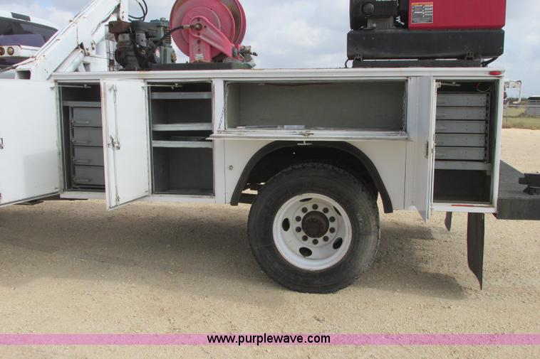 image for item I3500 2000 Ford F650 Super Duty XL Crew Cab service truck with crane