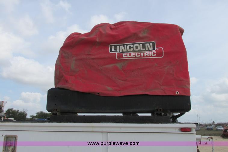 image for item I3500 2000 Ford F650 Super Duty XL Crew Cab service truck with crane