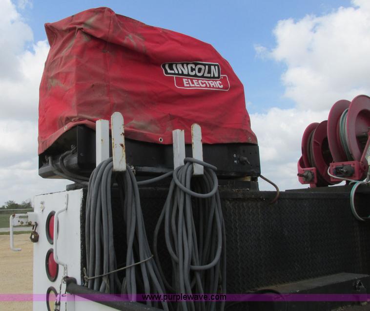 image for item I3500 2000 Ford F650 Super Duty XL Crew Cab service truck with crane