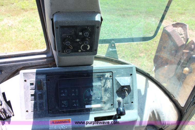 image for item J1202 1996 Case 580 Super L backhoe