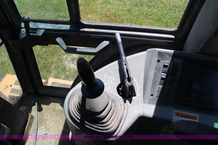 image for item J1202 1996 Case 580 Super L backhoe