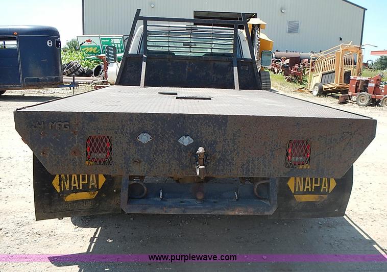 image for item J1206 1991 Ford F450 Super Duty flatbed truck
