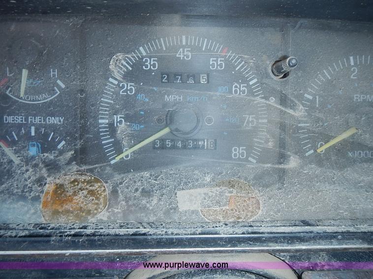 image for item J1206 1991 Ford F450 Super Duty flatbed truck