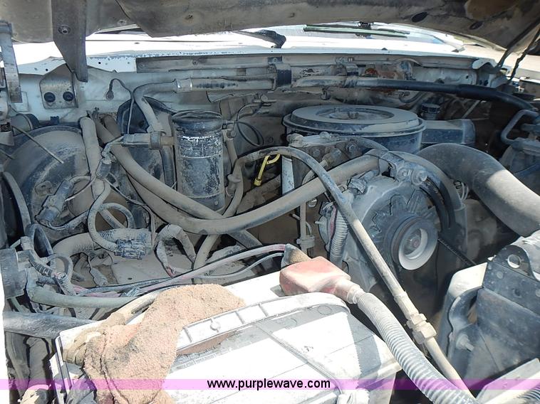 image for item J1206 1991 Ford F450 Super Duty flatbed truck