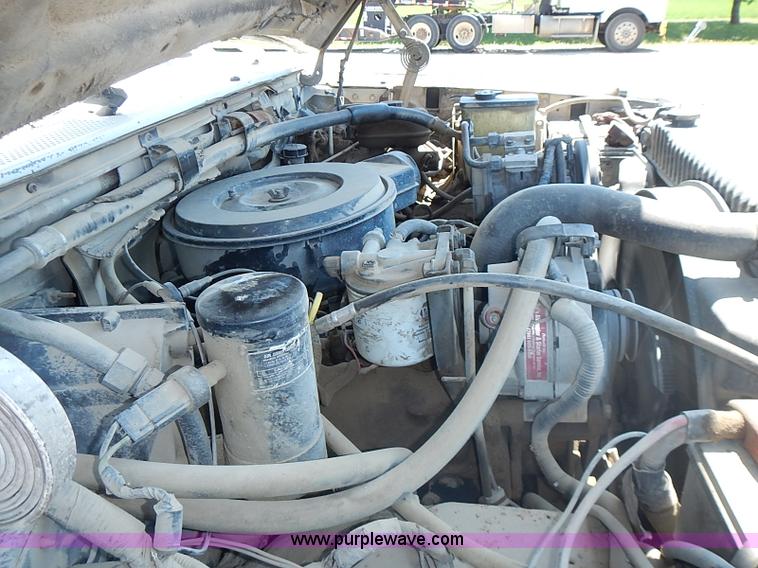 image for item J1206 1991 Ford F450 Super Duty flatbed truck