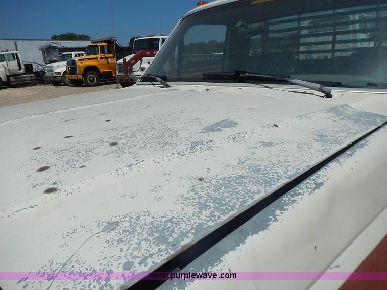 image for item J1206 1991 Ford F450 Super Duty flatbed truck