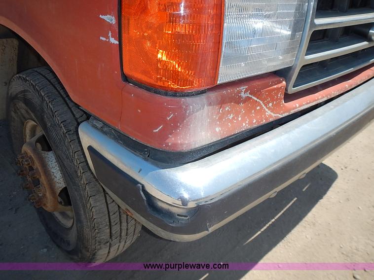 image for item J1206 1991 Ford F450 Super Duty flatbed truck
