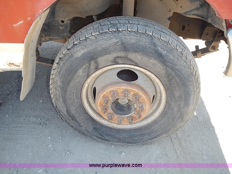 image for item J1206 1991 Ford F450 Super Duty flatbed truck