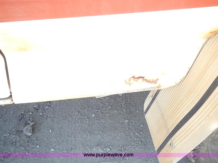 image for item J1206 1991 Ford F450 Super Duty flatbed truck