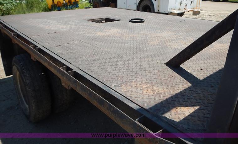 image for item J1206 1991 Ford F450 Super Duty flatbed truck