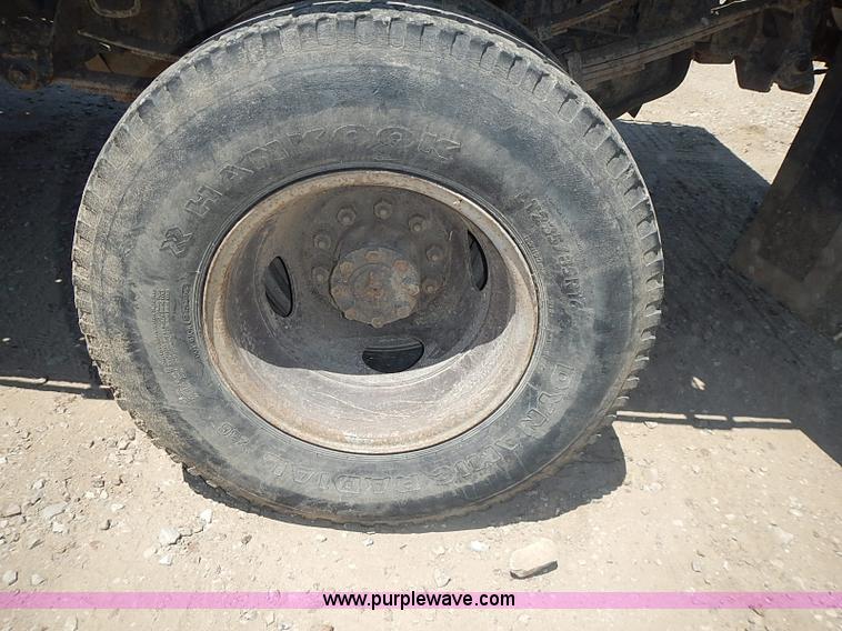 image for item J1206 1991 Ford F450 Super Duty flatbed truck