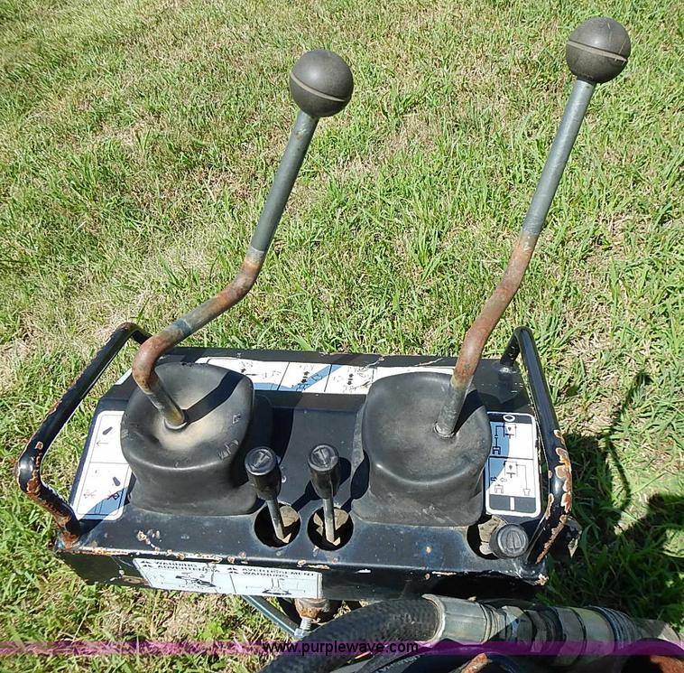 image for item J2103 Compact 90SS scat hoe skid steer attachment