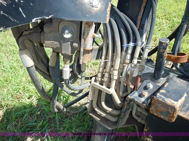 image for item J2103 Compact 90SS scat hoe skid steer attachment