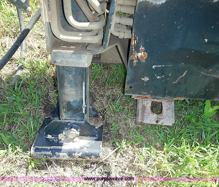 image for item J2103 Compact 90SS scat hoe skid steer attachment