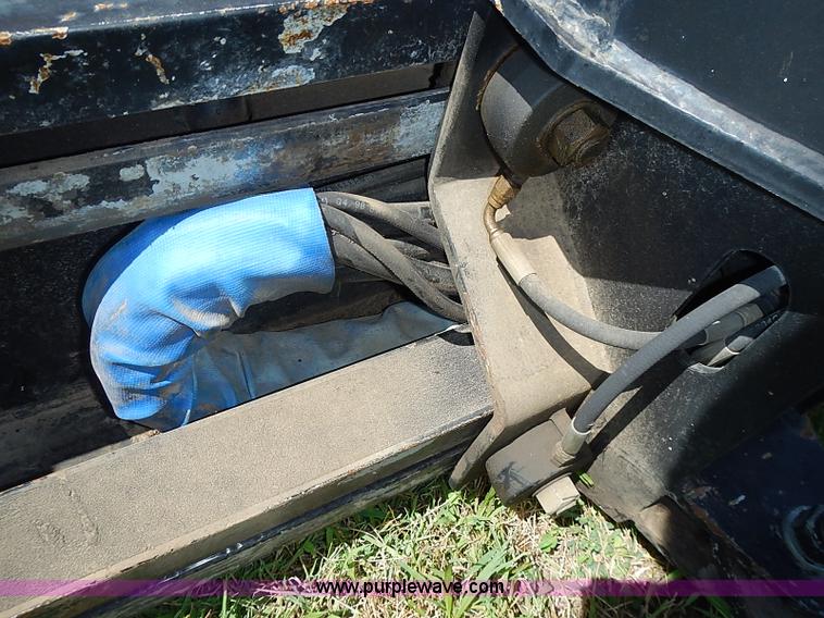 image for item J2103 Compact 90SS scat hoe skid steer attachment