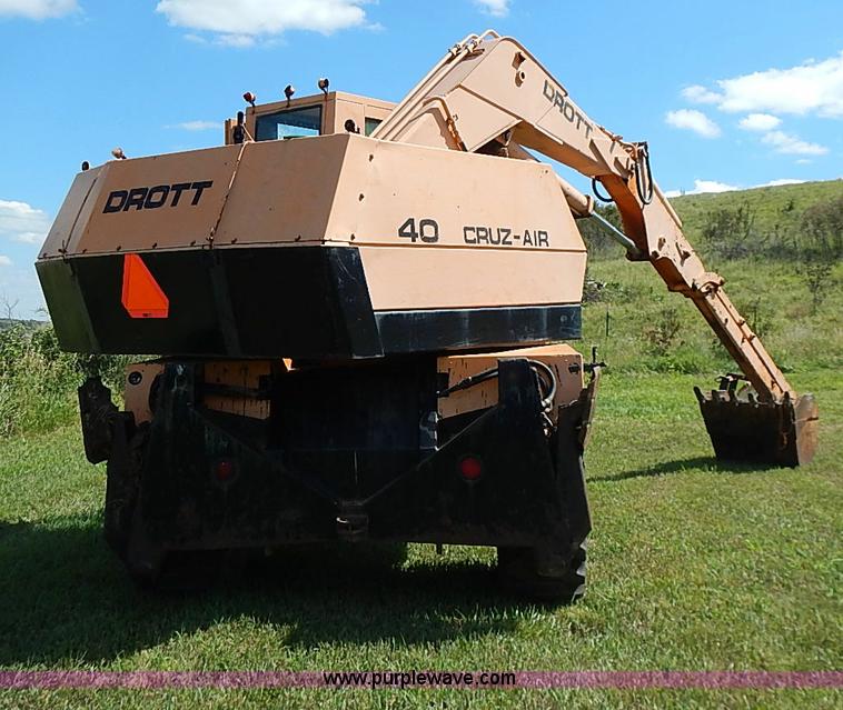 image for item J2107 1985 Drott 40BYR Cruz-air rubber tire excavator