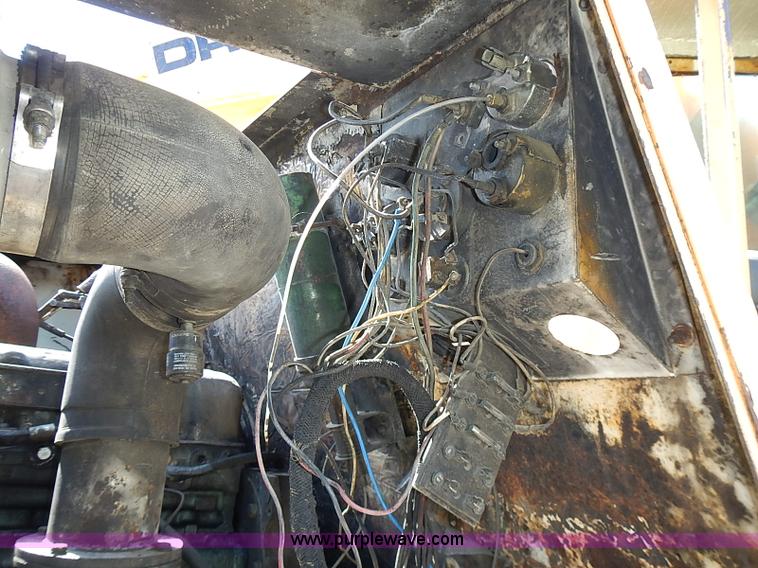 image for item J2107 1985 Drott 40BYR Cruz-air rubber tire excavator