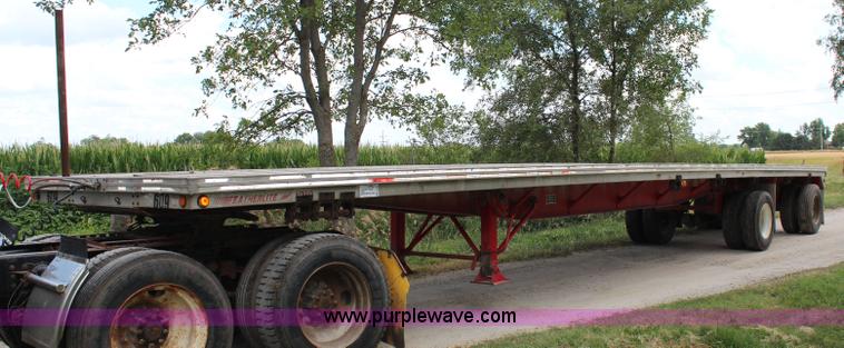 image for item G5393 1994 Featherlite 1010 flatbed trailer