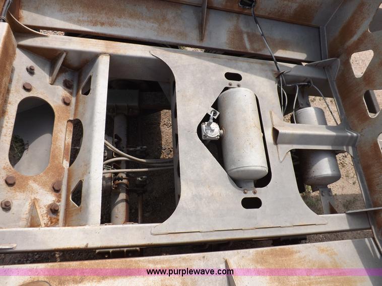 image for item H9248 1993 Trail King TKS4BD0-402 belly dump trailer