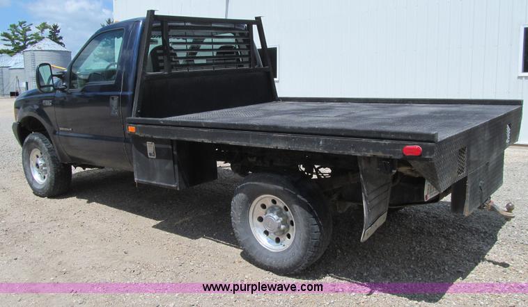 image for item E4927 2001 Ford F350 Super Duty XL flatbed truck