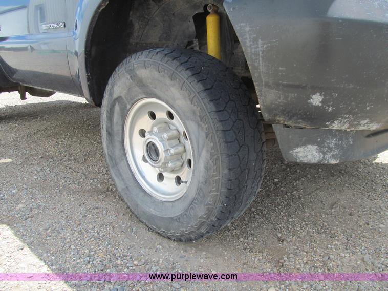 image for item E4927 2001 Ford F350 Super Duty XL flatbed truck