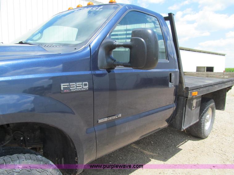 image for item E4927 2001 Ford F350 Super Duty XL flatbed truck