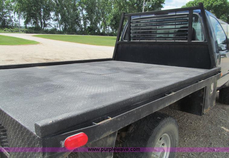 image for item E4927 2001 Ford F350 Super Duty XL flatbed truck
