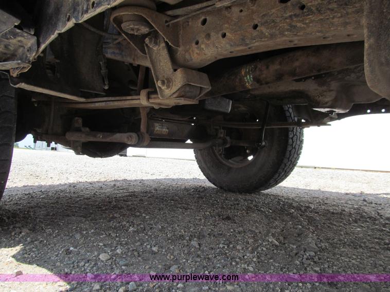 image for item E4927 2001 Ford F350 Super Duty XL flatbed truck