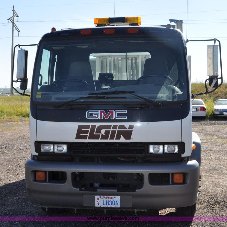 image for item F2050 1999 GMC T7500 Elgin street sweeper