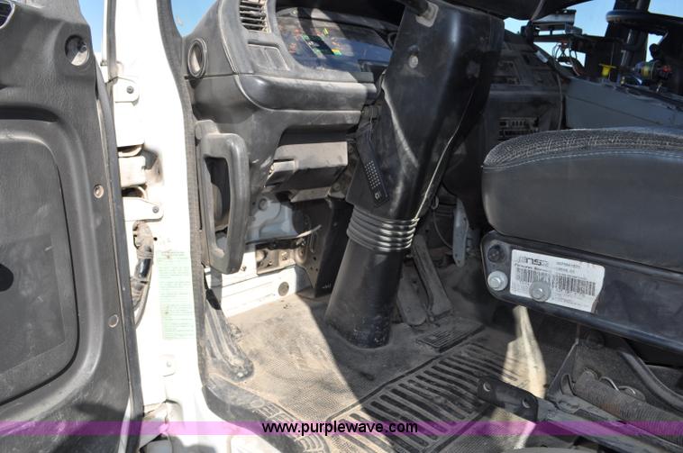 image for item F2050 1999 GMC T7500 Elgin street sweeper