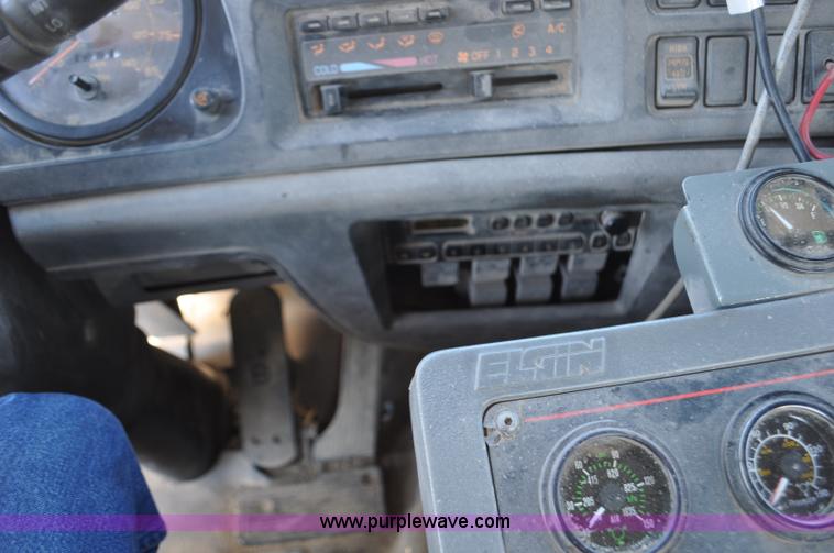 image for item F2050 1999 GMC T7500 Elgin street sweeper