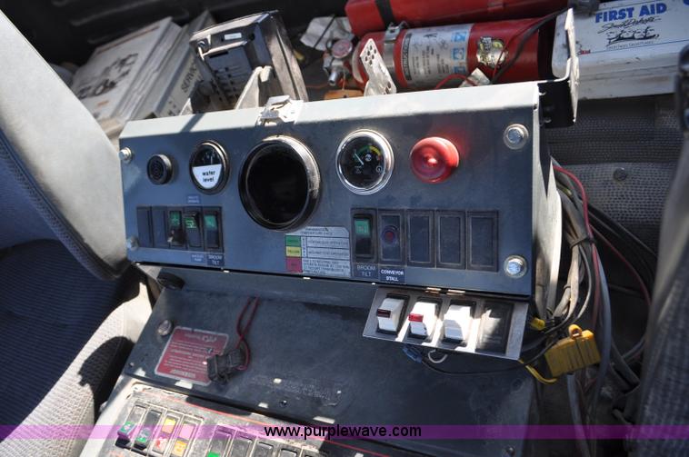 image for item F2050 1999 GMC T7500 Elgin street sweeper