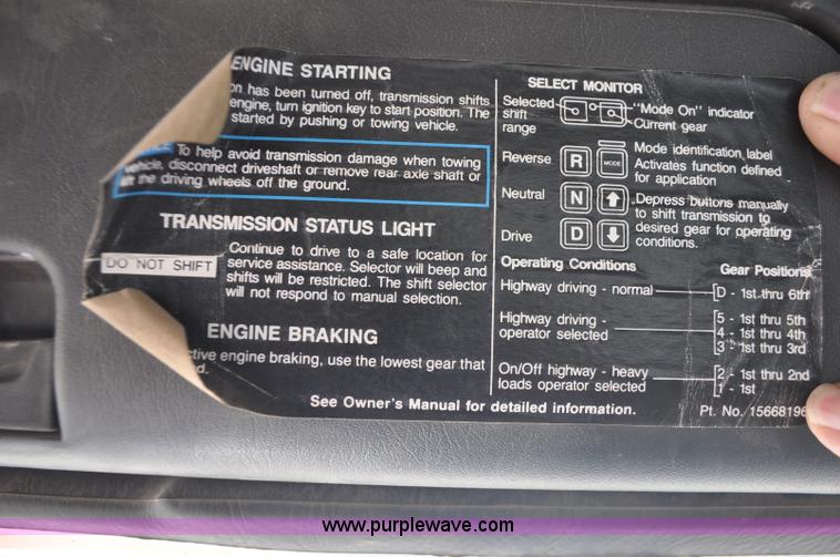 image for item F2050 1999 GMC T7500 Elgin street sweeper