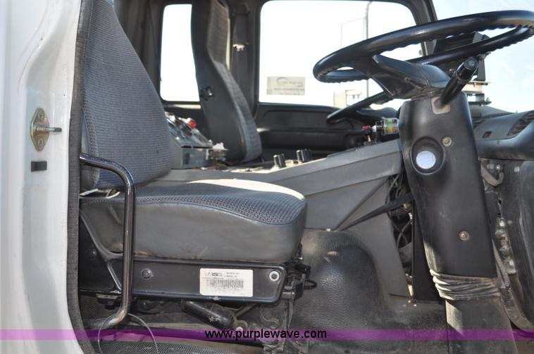 image for item F2050 1999 GMC T7500 Elgin street sweeper